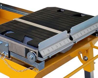 The cutting table features an injection mold rubber mat that provides a firm durable work surface.